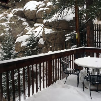 Alpen Way Chalet Mountain Lodge - A snowy pretty deck. - Hotels Near Me - Evergreen, Colorado