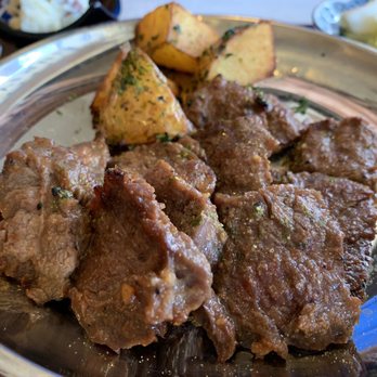 ABURIYA IBUSHI - Close up of open flame cooked beef flank steak.  Tender and flavorful with house made umami-producing seasoning. - Japanese Near Me - Honolulu, Hawaii