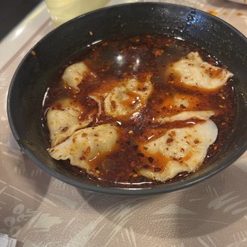 Dumpling World - Beef & Onion Spicy And Sour Dumplings - Chinese Near Me - Sugar Land, Texas Dumpling World - Beef & Onion Spicy And Sour Dumplings - Chinese Near Me - Sugar Land, Texas