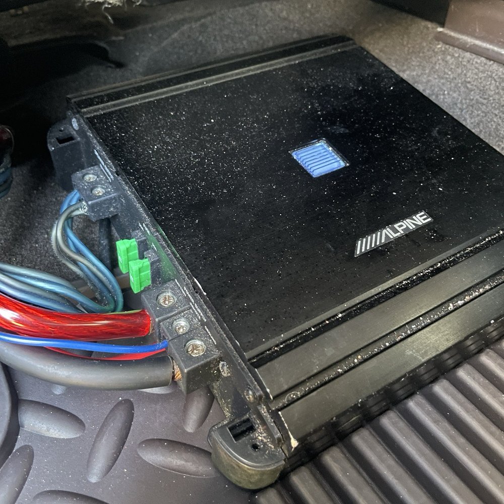 Amp laying in the back floor board