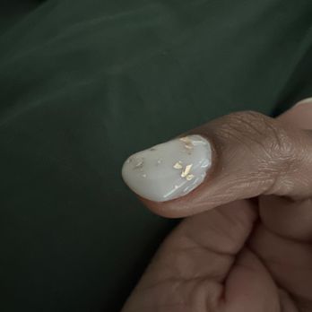 Carytown Nails & Spa - Flooded cuticle, uneven coats, chunks of gel not removed undeneath - Nail Salons Near Me - Richmond, Virginia