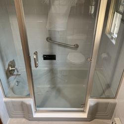 Universal Home Concepts - Glass doors can be added to a tubcut system
