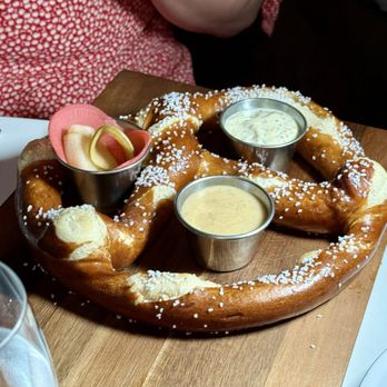 Harry & Fritz - Dutchy Board - jumbo Bavarian-style soft pretzel served with a beer cheese sauce, a whole grain mustard sauce and an assortment of pickles - New American Near Me - Pittsburgh, Pennsylvania