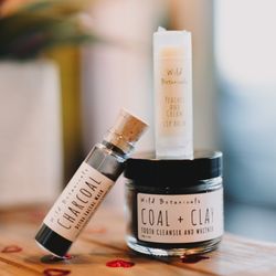 Love Couture Boutique - Wild Botanicals charcoal face mask & lip balm. All natural and amazing!!!
