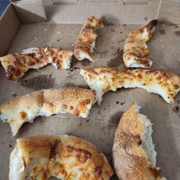 Too much of this and not enough toppings.  I'd eaten into each piece a bit too.