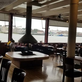 Manny's Steakhouse - Interior shot of bar area, flame pit, restaurant seating area, and gorgeous views of the Mare Island Straight. - Steakhouses Near Me - Vallejo, California