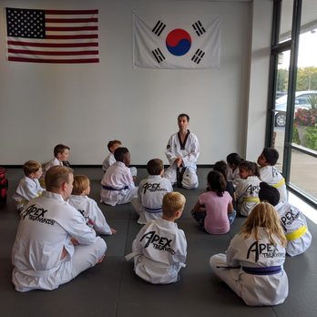 Apex Taekwondo Center - Students demonstrating focus by listening - Taekwondo Near Me - Fishers, Indiana Apex Taekwondo Center - Students demonstrating focus by listening - Taekwondo Near Me - Fishers, Indiana