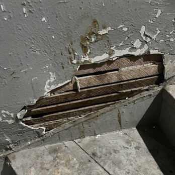High Fidelity Property Management - Back stairs and wall that abuts kitchen - Property Management Near Me - Chicago, Illinois High Fidelity Property Management - Back stairs and wall that abuts kitchen - Property Management Near Me - Chicago, Illinois