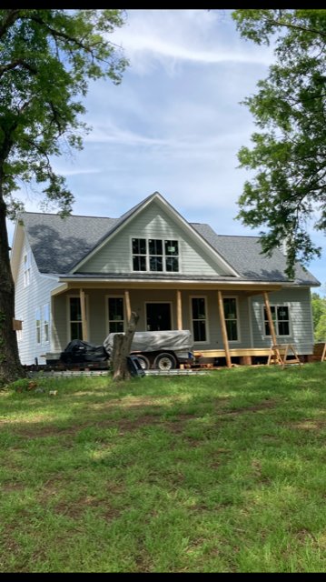 Slide of Gutter Guys Construction