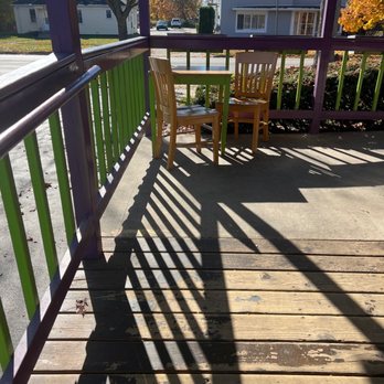 Great Lakes Ice Cream - the shadow of a chair on a porch - Ice Cream & Frozen Yogurt Near Me - Midland, Michigan