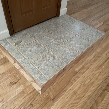 Madeira Flooring - Fantastic attention to detail around the tile entry way - Flooring Near Me Madeira Flooring - Fantastic attention to detail around the tile entry way - Flooring Near Me