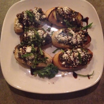 Uccello's - Standale/Walker - Mushroom Crostini- The combination of mushrooms, goat cheese, basil, and vinaigrette sounds interesting but it works. I like it. - Pizza Near Me - Walker, Michigan Uccello's - Standale/Walker - Mushroom Crostini- The combination of mushrooms, goat cheese, basil, and vinaigrette sounds interesting but it works. I like it. - Pizza Near Me - Walker, Michigan