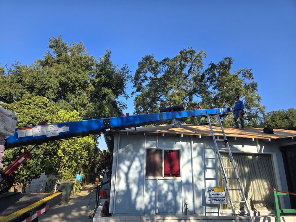 Slide of Musulman Roofing