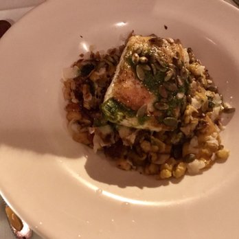 Duner's Restaurant - Baked halibut with pumpkin seeds and pesto sauce over spatzel - New American Near Me - Charlottesville, Virginia