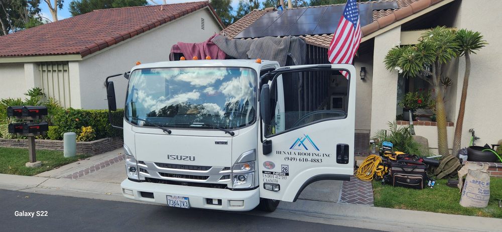 Slide of Henala Roofing