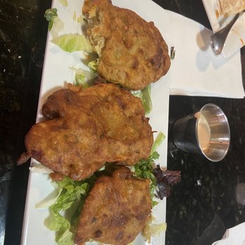 Dunns River Island Cafe - Salt Fish Fritters Really enjoyed them but they were served with a thousand island sauce. I skipped the dressing. - Caribbean Near Me - Tampa, Florida