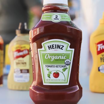 Wiener Waggin - ketchup bottles on a table - Hot Dogs Near Me Wiener Waggin - ketchup bottles on a table - Hot Dogs Near Me