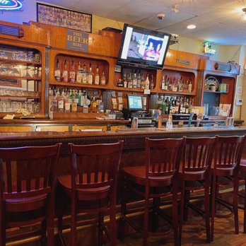 Gordo's Pub & Grill - a bar with wooden chairs - Burgers Near Me - Norwood, Ohio