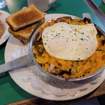 Frog Pond - Eggs in a Pan. Your choice of meat and eggs with perfectly grilled veggies and cheese. It even comes with a toast medly. Great brunch meal! - Breakfast & Brunch Near Me - North Redington Beach, Florida Frog Pond - Eggs in a Pan. Your choice of meat and eggs with perfectly grilled veggies and cheese. It even comes with a toast medly. Great brunch meal! - Breakfast & Brunch Near Me - North Redington Beach, Florida