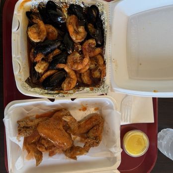 Garners Ferry Seafood & More - 1/2 Spicy Garlic Shrimp Only  1/2 spicy garlic mussels 4 whole wings, hot - Seafood Near Me - Columbia, South Carolina