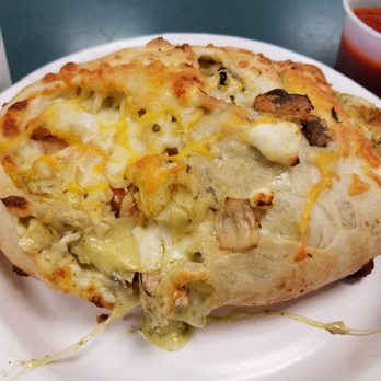 Nikki's Pizza - A close up pic of my Veggie Calzone. ($11.95) - Pizza Near Me - Lahaina, Hawaii Nikki's Pizza - A close up pic of my Veggie Calzone. ($11.95) - Pizza Near Me - Lahaina, Hawaii