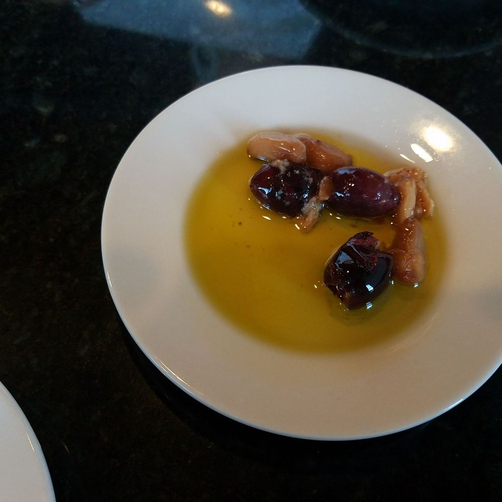 A generous one olive and one garlic clove per person. A generous one olive and one garlic clove per person.