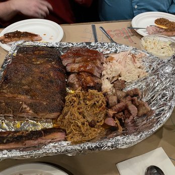 KC's Rib Shack - Feed bag shovel (after a minute of eating!): ribs, pulled pork, sausage, chicken, and brisket. - Barbeque Near Me - Manchester, New Hampshire KC's Rib Shack - Feed bag shovel (after a minute of eating!): ribs, pulled pork, sausage, chicken, and brisket. - Barbeque Near Me - Manchester, New Hampshire
