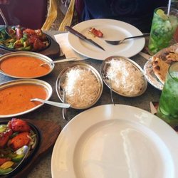 Happy Valley Indian Restaurant - 3 types of chicken, and an impatient man who couldn't wait to ruin the photo with chicken on his plate.