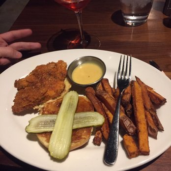 Doc B's Restaurant + Bar - Garlic aioli fried chicken sandwich with sweet potato fries and honey mustard, and a negroni of course - yumzah ! - New American Near Me - Chicago, Illinois