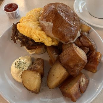 Cullum's Attaboy - SMOKED BRISKET, EGG & CHEESE-aka the best breakfast sandwich you will ever eat - Breakfast & Brunch Near Me - San Antonio, Texas