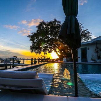 PCS Pools - Pool with loungers overlooking the intercoastal in pinellas county - Patio Coverings Near Me - Largo, Florida