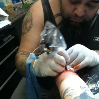 Showdown Tattoo Parlor - Jorge in his element - Tattoo Near Me - Walnut, California Showdown Tattoo Parlor - Jorge in his element - Tattoo Near Me - Walnut, California