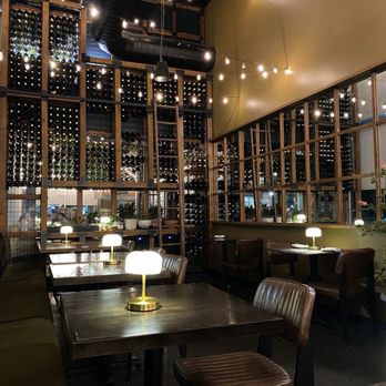 Saffron Indian Urban Kitchen - Interior with beautiful racks of wine - Indian Near Me - Omaha, Nebraska Saffron Indian Urban Kitchen - Interior with beautiful racks of wine - Indian Near Me - Omaha, Nebraska