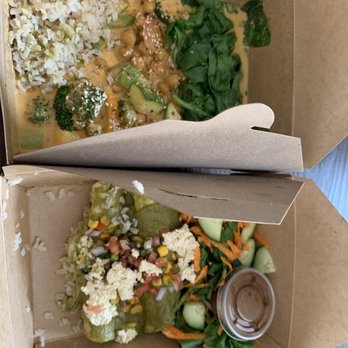 Juicery Plus - Curry with greens and brown rice, next to poblano enchiladas - Acai Bowls Near Me - El Paso, Texas