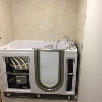 New Era Plumbing - a bathroom with a tub - Plumbing Near Me - Lockport, Illinois New Era Plumbing - a bathroom with a tub - Plumbing Near Me - Lockport, Illinois