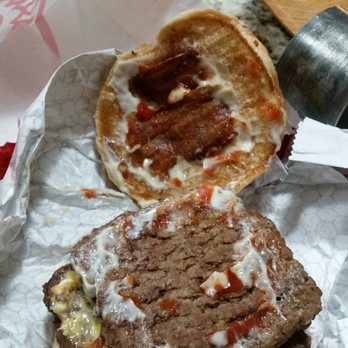 Wendy's - a burger and a knife - Burgers Near Me - Spring Hill, Tennessee