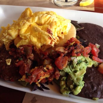 Chorizo - Pupusa with chorizo. Eggs scrambled (over easy is the default). - Latin American Near Me - Asheville, North Carolina