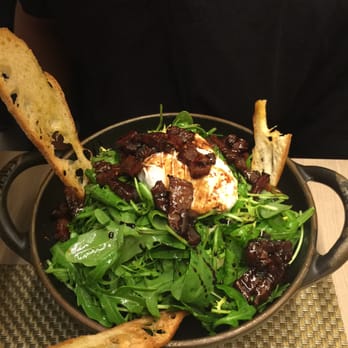 Les Cocottes - Poached egg with crispy bacon and rocket salad - Bistros Near Me - Paris, 01 Les Cocottes - Poached egg with crispy bacon and rocket salad - Bistros Near Me - Paris, 01