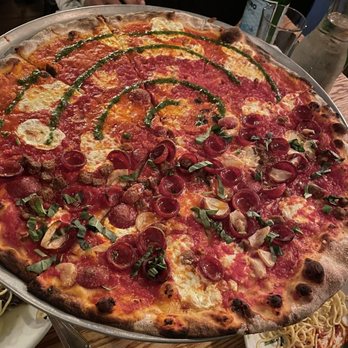 Rubirosa - Large Tie-Dye Pizza and Large Rubirosa Supreme Pizza (half and half) - Italian Near Me - New York, New York Rubirosa - Large Tie-Dye Pizza and Large Rubirosa Supreme Pizza (half and half) - Italian Near Me - New York, New York