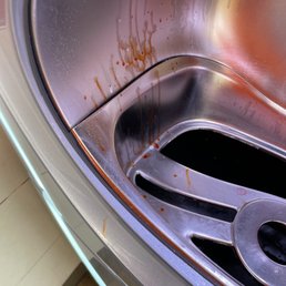 a dirty sink in a public restroom a dirty sink in a public restroom