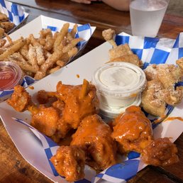Saucy wings over parchment