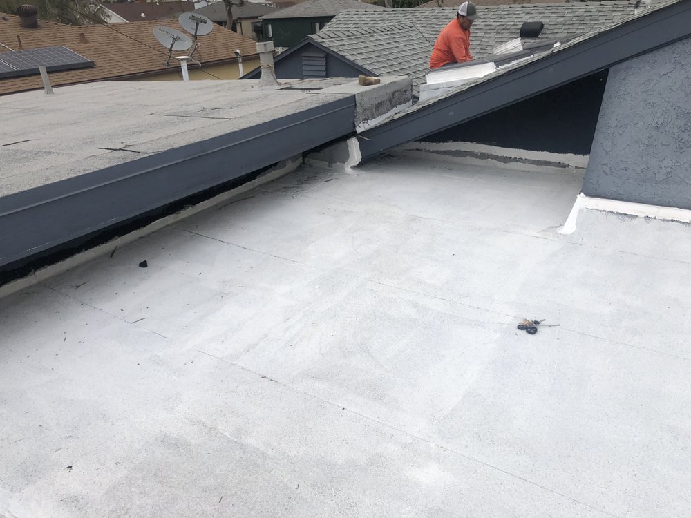 Slide of Huncho Roofer