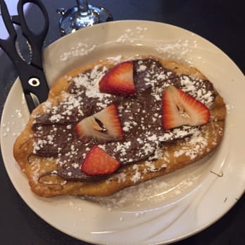 Osteria 166 - Fried dough with Nutella - Italian Near Me - Buffalo, New York Osteria 166 - Fried dough with Nutella - Italian Near Me - Buffalo, New York
