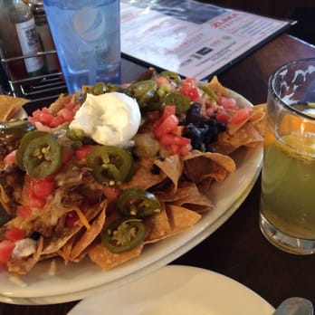 Kickapoo Tavern - Pulled pork nachos, highly recommended and a huge portion, even the half-size! - American Near Me - Keystone, Colorado