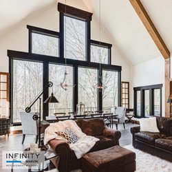 Infinity Replacement by Marvin - Infinity casement and special shape picture windows in ebony finish with black hardware.