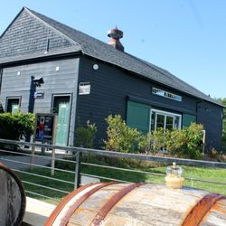 Bar Harbor Winery - View of winery from barrel fountain