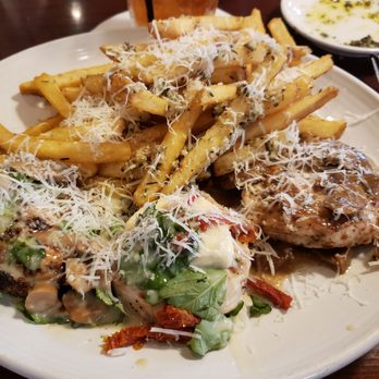 Carrabba's Italian Grill - Chicken trio with an upgrade to garlic fries - Italian Near Me - St. Augustine, Florida Carrabba's Italian Grill - Chicken trio with an upgrade to garlic fries - Italian Near Me - St. Augustine, Florida