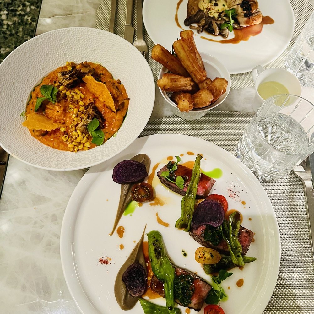 Le Jardinier - Second entree spread plus extras we got - French Near Me - Houston, Texas Le Jardinier - Second entree spread plus extras we got - French Near Me - Houston, Texas