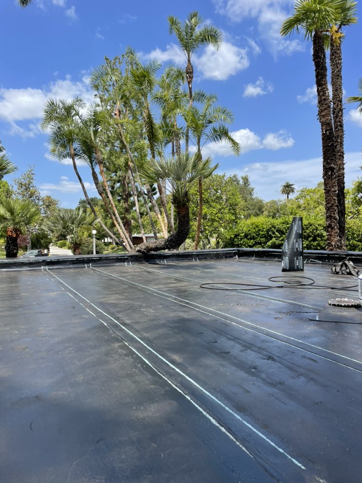 Slide of New Village Roofing