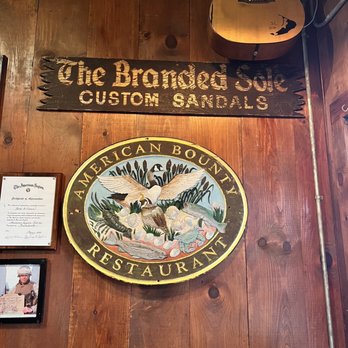 The Rose and Crown - a guitar hanging on the wall - American Near Me - Nantucket, Massachusetts